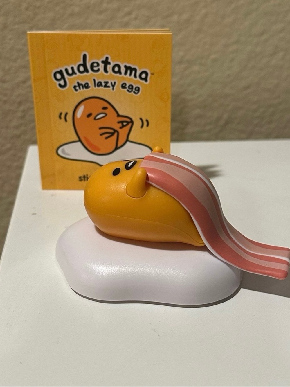 Gudetama The Lazy Egg Yellow Figurine with Pink Bacon Accessory